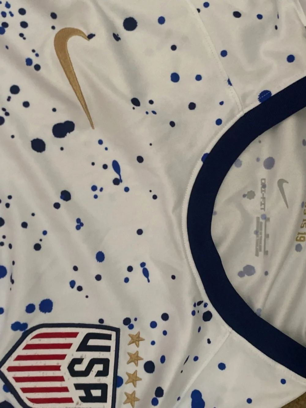 Nike  USA White Jersey with Blue Splatter and Gold Swoosh